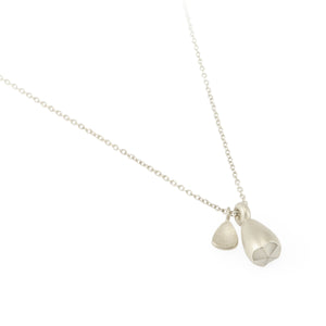 Silver pod and leaf pendant by Ashley Heather