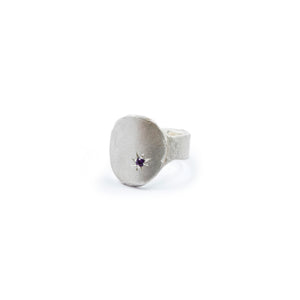 Cigar-label ring with purple stone by Geraldine Fenn