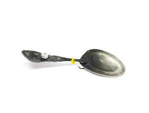 Yellow silver spoon by Eric Loubser